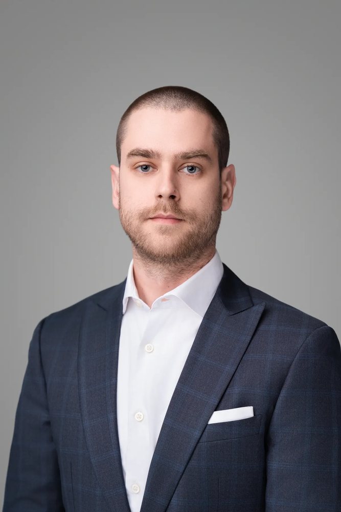 A corporate headshot by HeadShot Photo